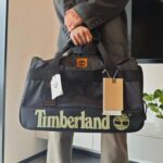 حقيبة سفر رجالية تيمبرلاند لون الاسود الياقوتي | واتشز برايم