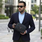 Tommy Hilfiger Black Leather Mens Clutch Bag Gift Box Patterned Logo | Watches Prime