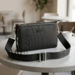 Lacoste Black Piqué Crossbody Bag & Clutch | Watches Prime