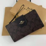 COACH Women's Signature Phone Wallet C2874 | Watches Prime COACH Women's Signature Phone Wallet C2874 | Watches Prime